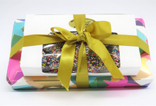 1/2lb ASSORTED & 1/2lb NONPAREILS